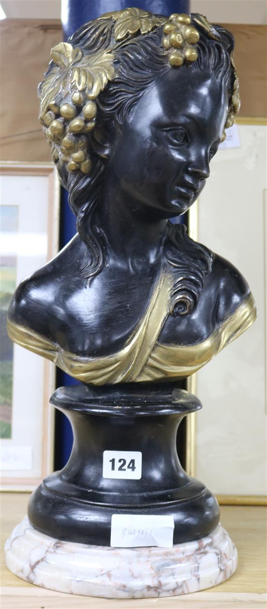 A bronze bust of lady
